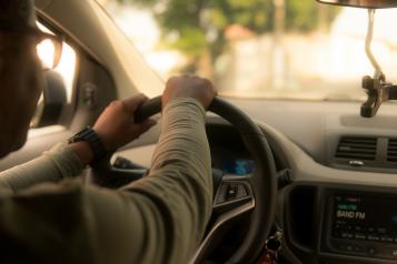 Looking over a taxi driver's shoulder